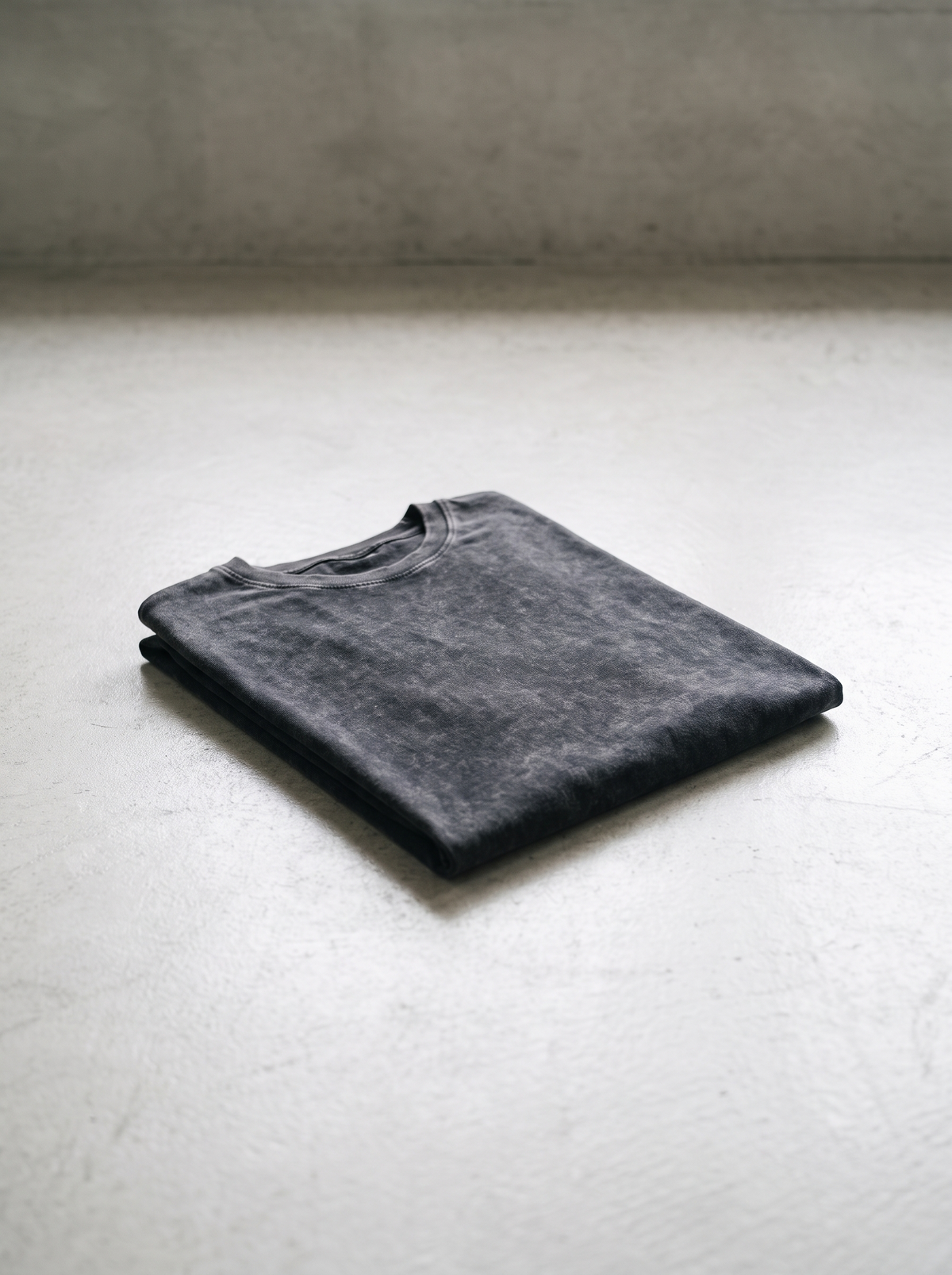 Vintage Washed Oversized T-Shirt folded on concrete