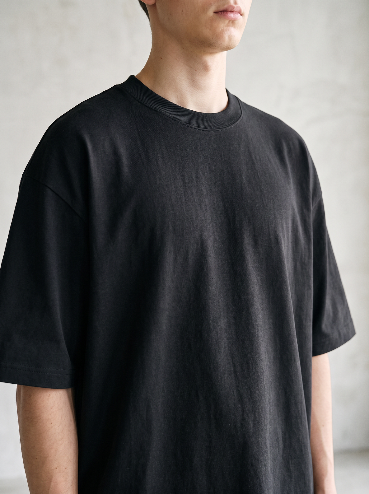Black 300GSM Heavyweight Oversized T-Shirt worn close up